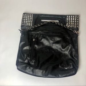 Black studded women’s clutch